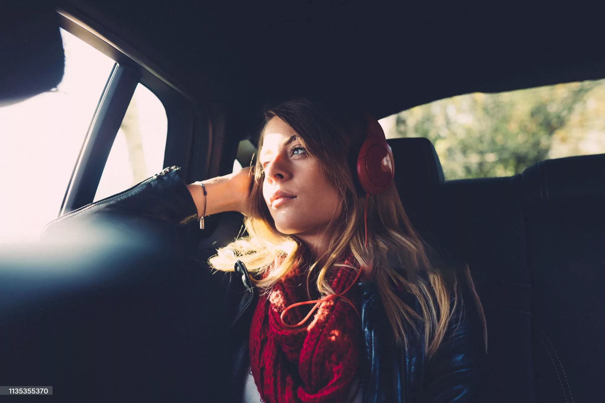 Teenage girl traveling with car